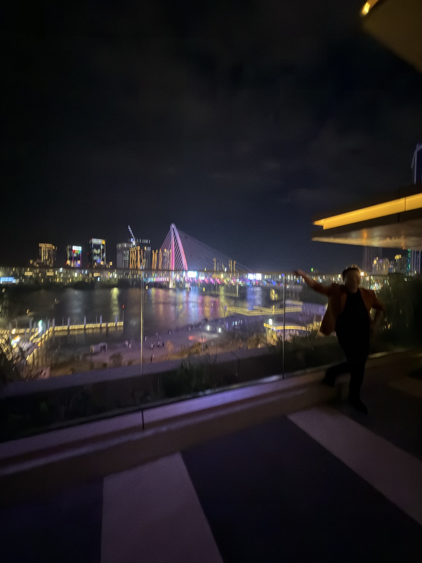 Night view across Ba Son Bridge from the terrace
