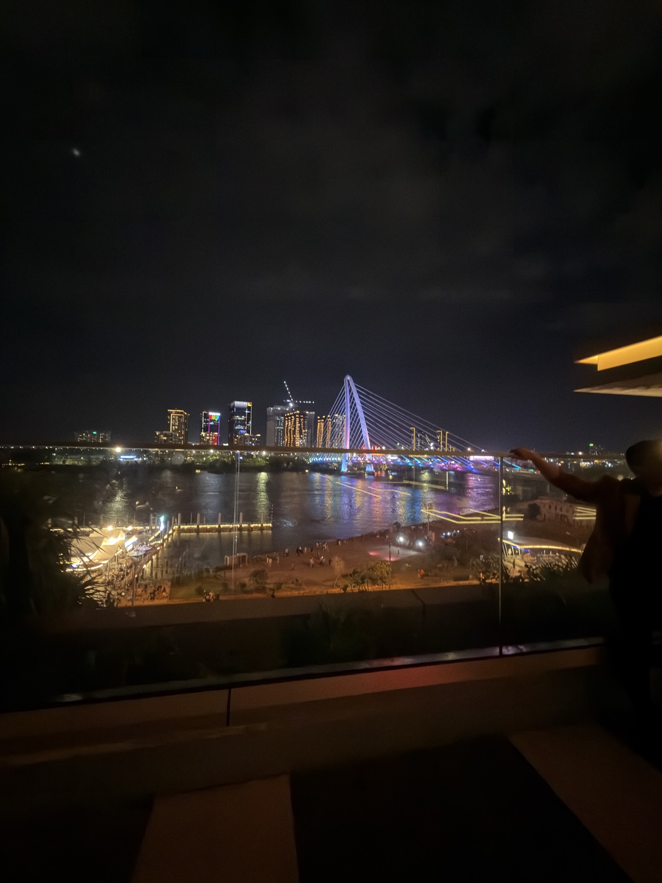 Grand Marina towers and Ba Son Bridge seen from the riverfront terrace